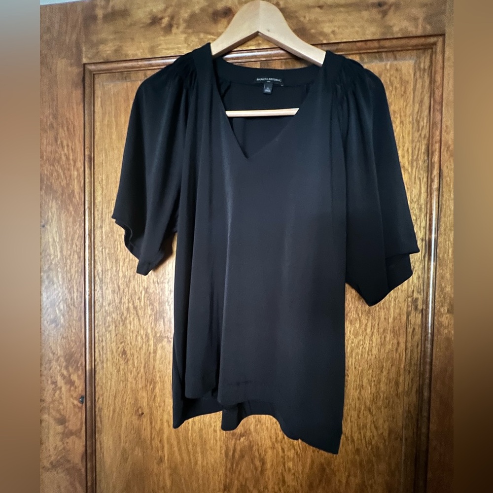 Banana Republic size L black top. Non smoking home.